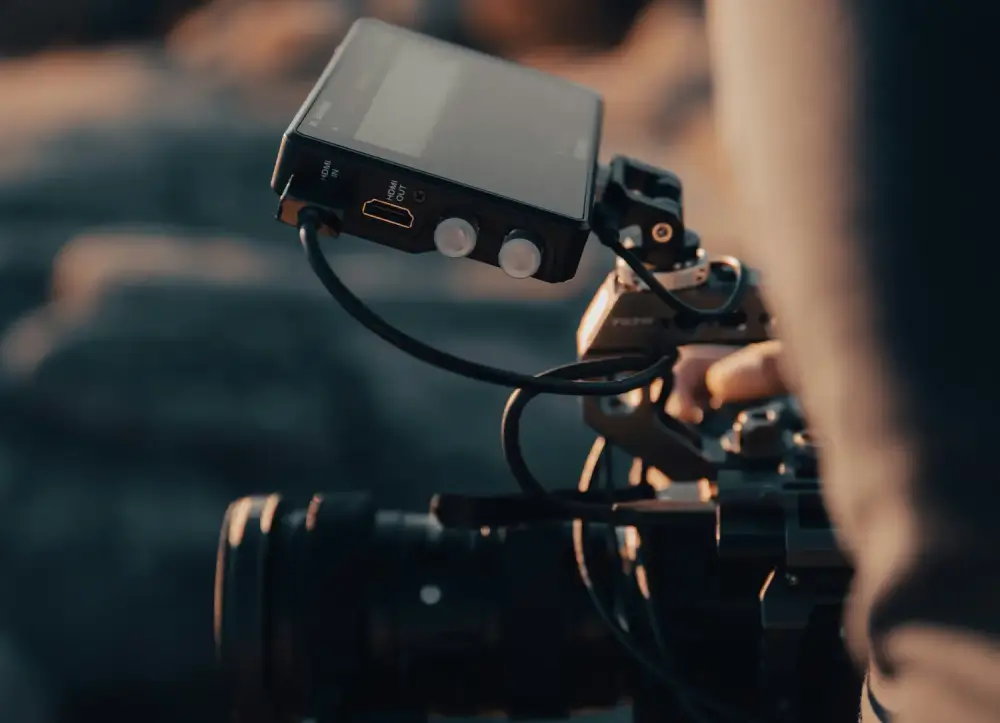 man holding video camera